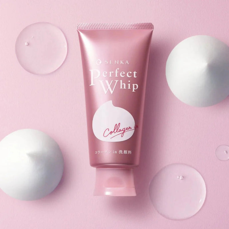 Pink skincare product tube labeled 'Kose' on a pink background with white spheres.
