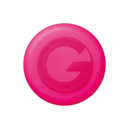 A round pink moving rubber spiky edge hair wax container with the letter 'G' in the center.