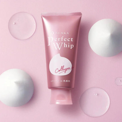 Pink skincare product tube labeled 'Kose' on a pink background with white spheres.