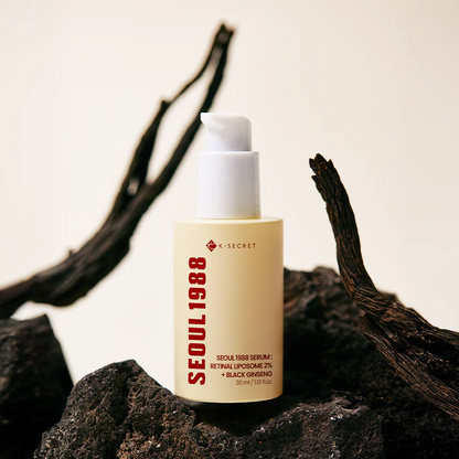 Skincare serum bottle labeled 'Seoul 1988' on a dark background