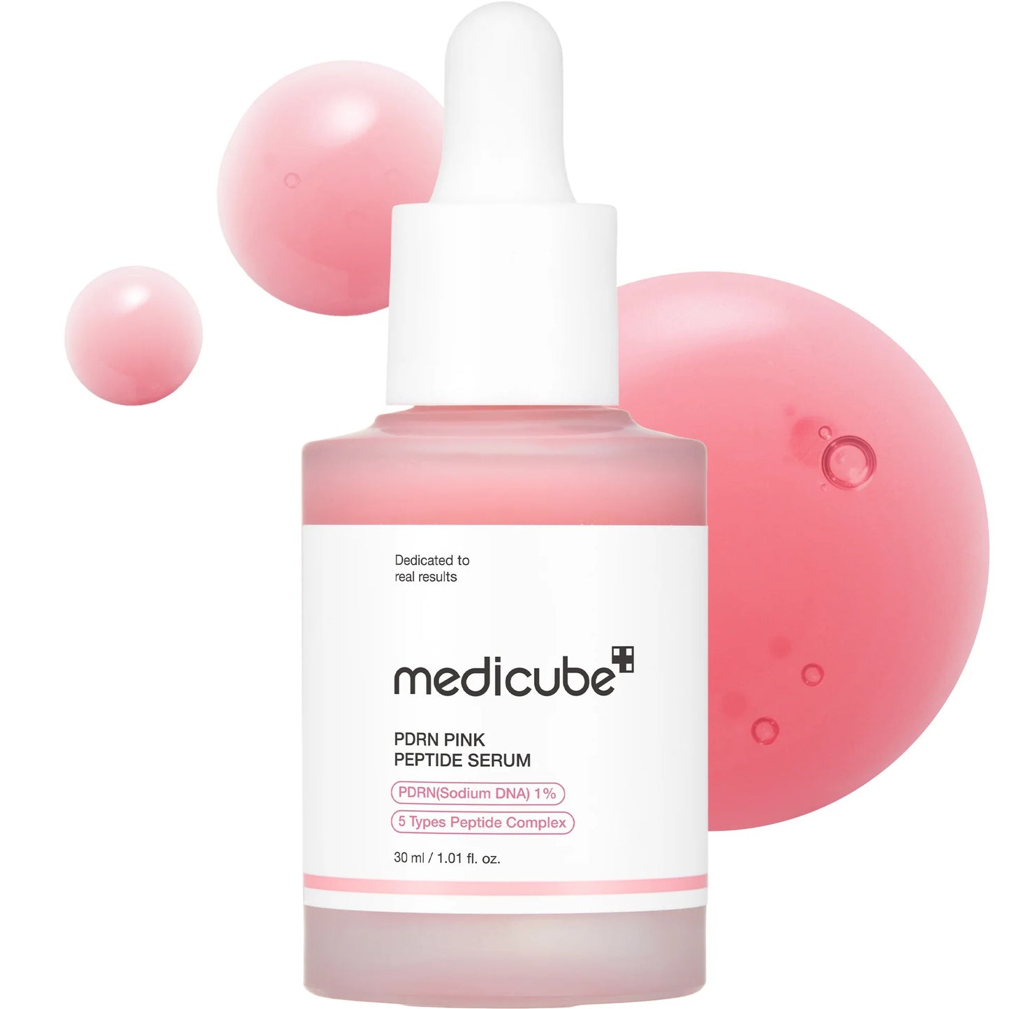 Medicube PDN Pink Peptide Serum with pink spheres on a white background