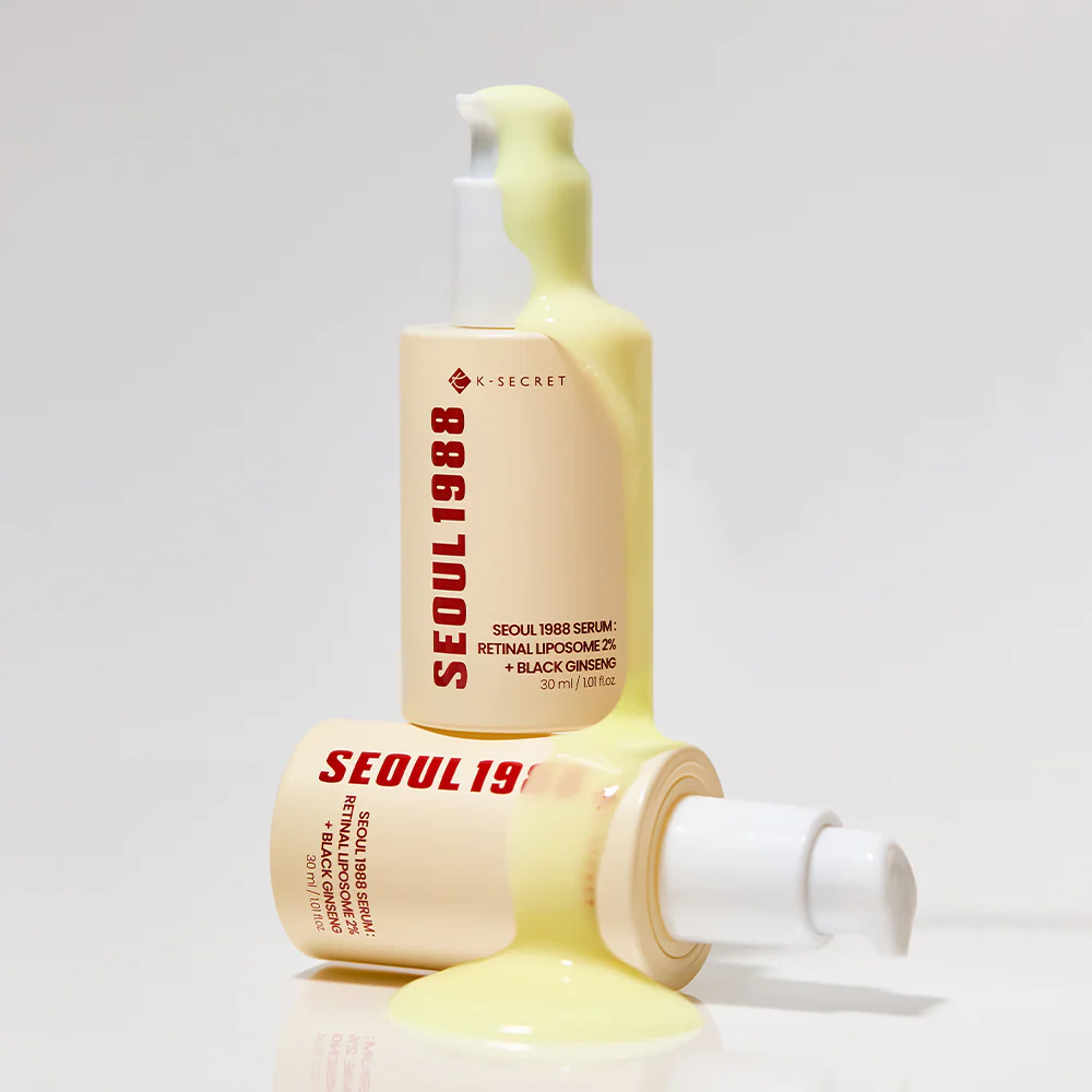 Two bottles of Seoul 1988 skincare product on a light gray background