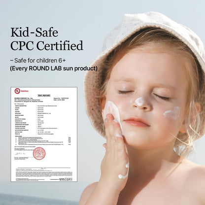 Child applying sun cream with a certification document on a light blue background