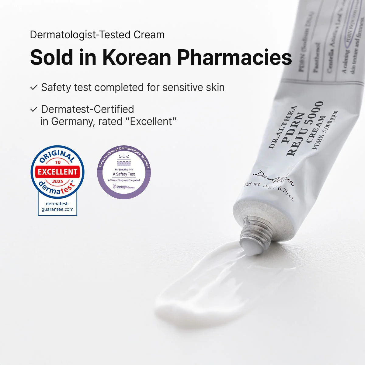 Tube of Dermatologist-Tested Cream with Certifications on a White Background