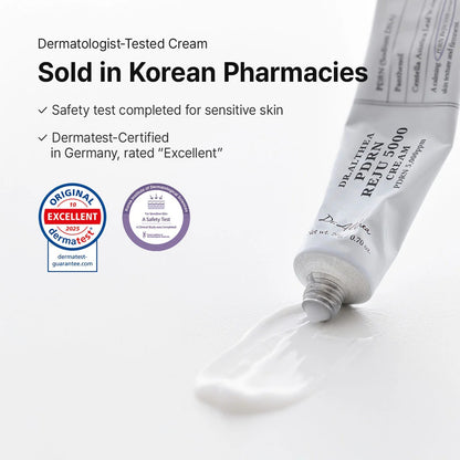 Tube of Dermatologist-Tested Cream with Certifications on a White Background
