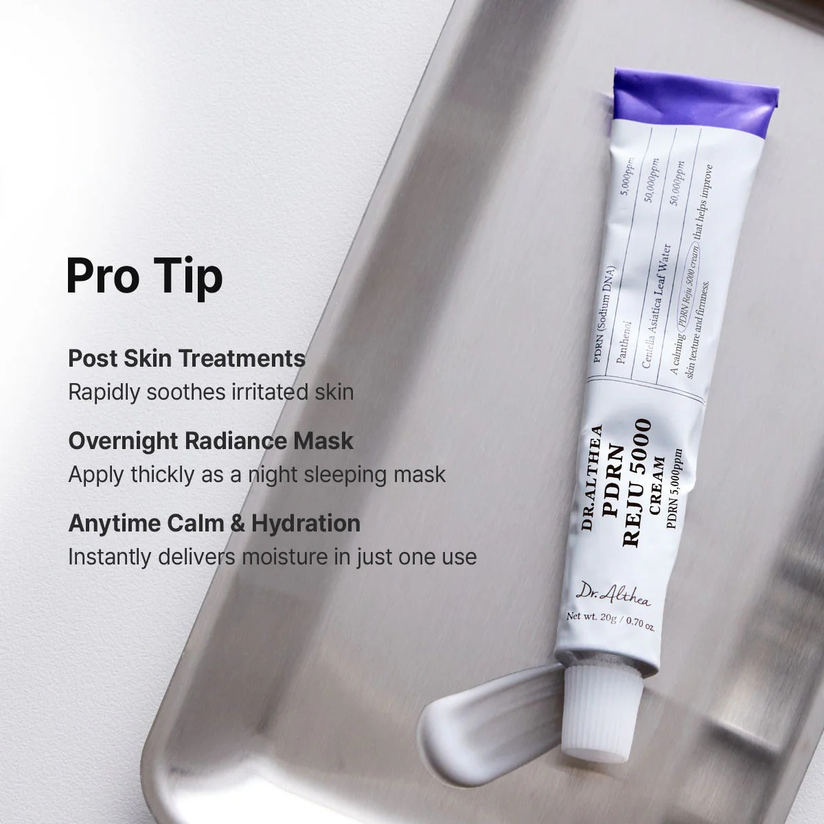 Tube of Dr. Althea cream on a metallic tray with text about skincare benefits.